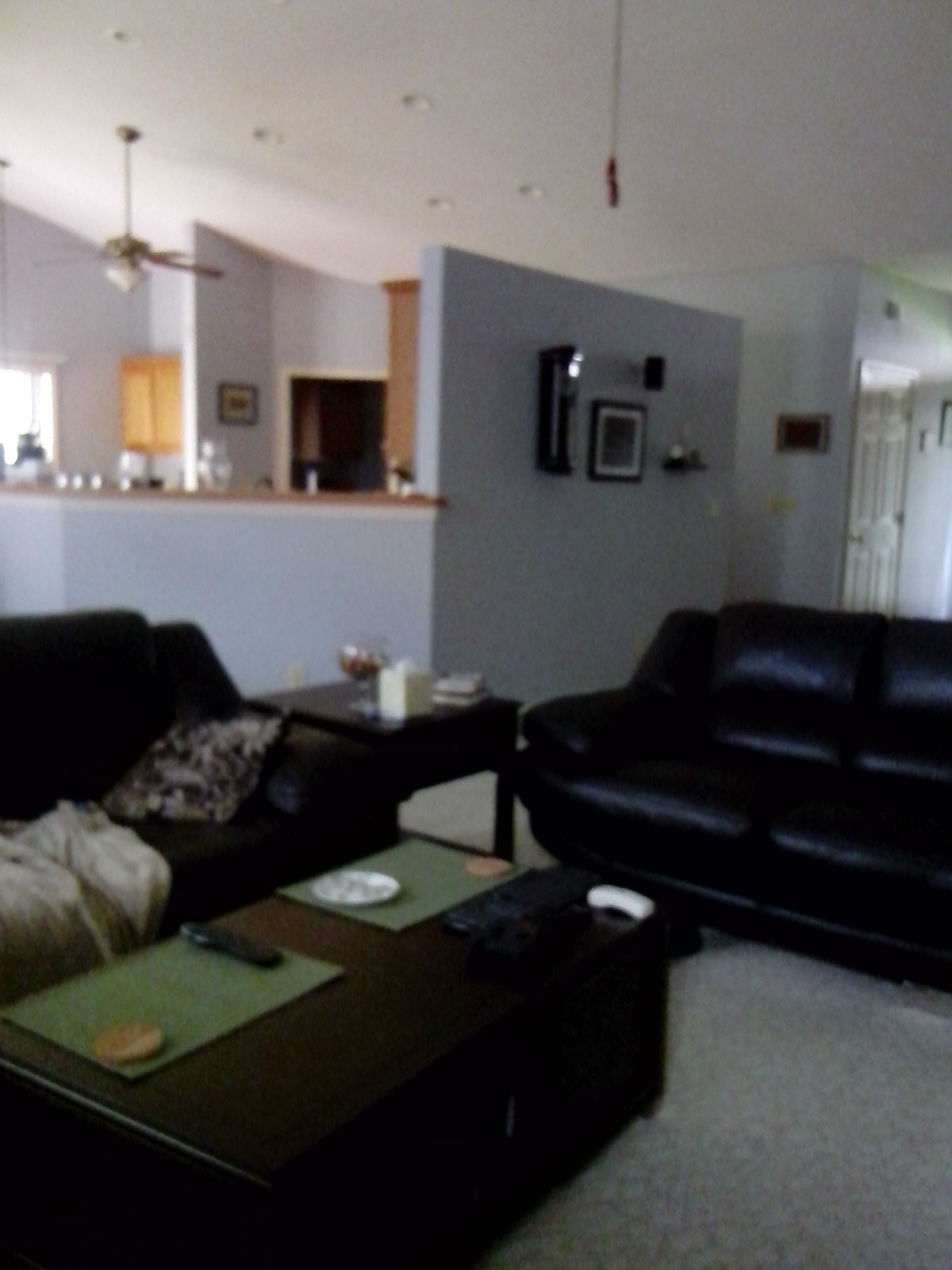 Living area and dated kitchen before the Kitchen Express remodel in Central New York