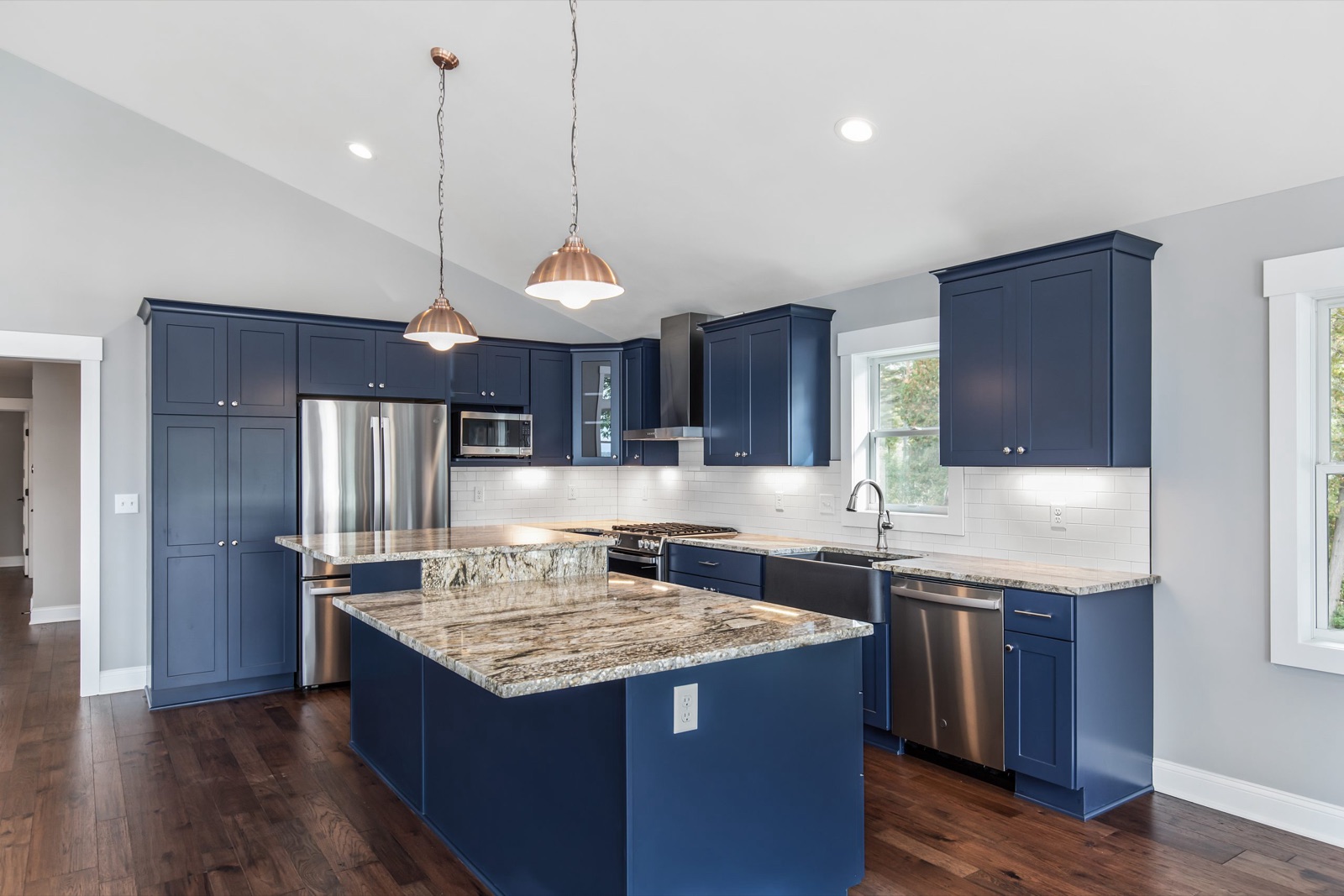 Navy blue shaker kitchen with granite island. Kitchen Express, Syracuse NY