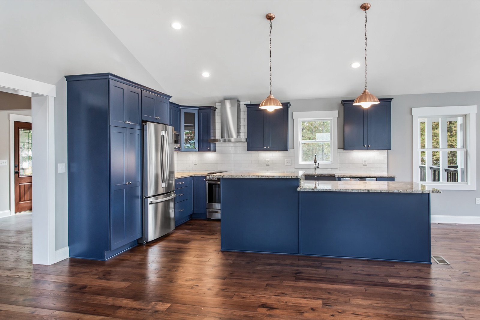 Navy blue kitchen with copper pendant lighting. Kitchen Express, Syracuse NY