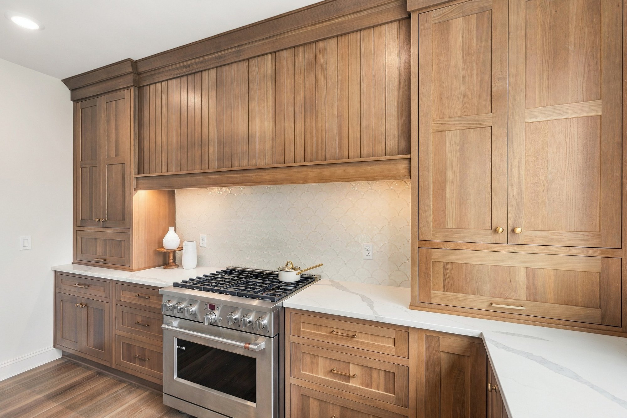 Cordelle Custom Homes 2026 Parade of Homes — Professional range and waterfall counter