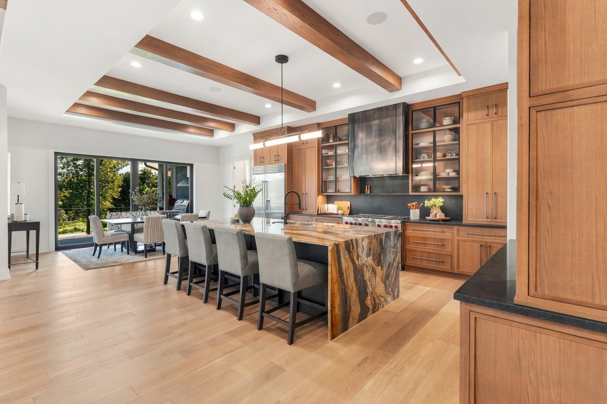 Exhale 2026 Parade Home — Island seating and open dining