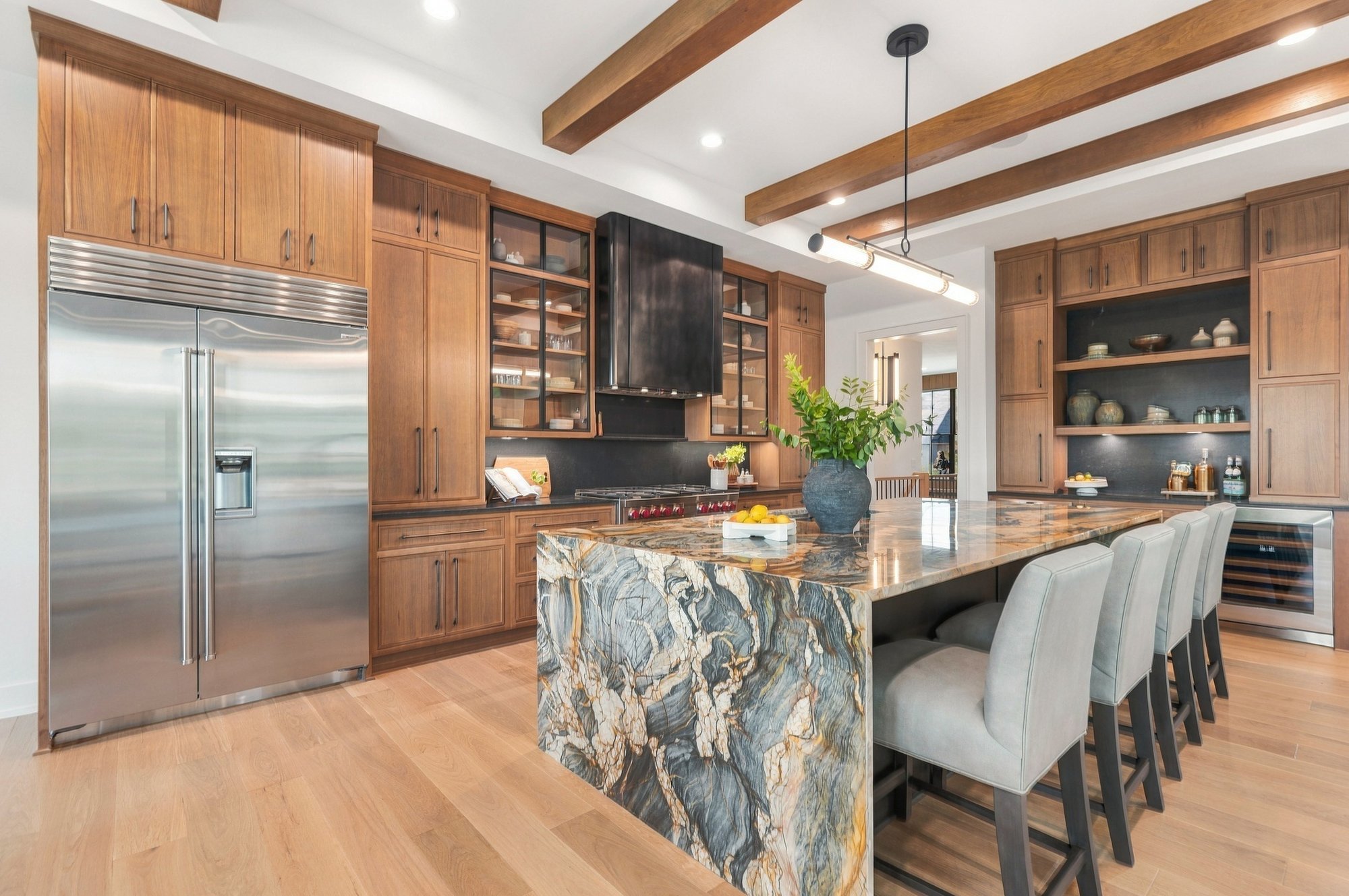 Exhale 2026 Parade Home — Waterfall quartzite island detail
