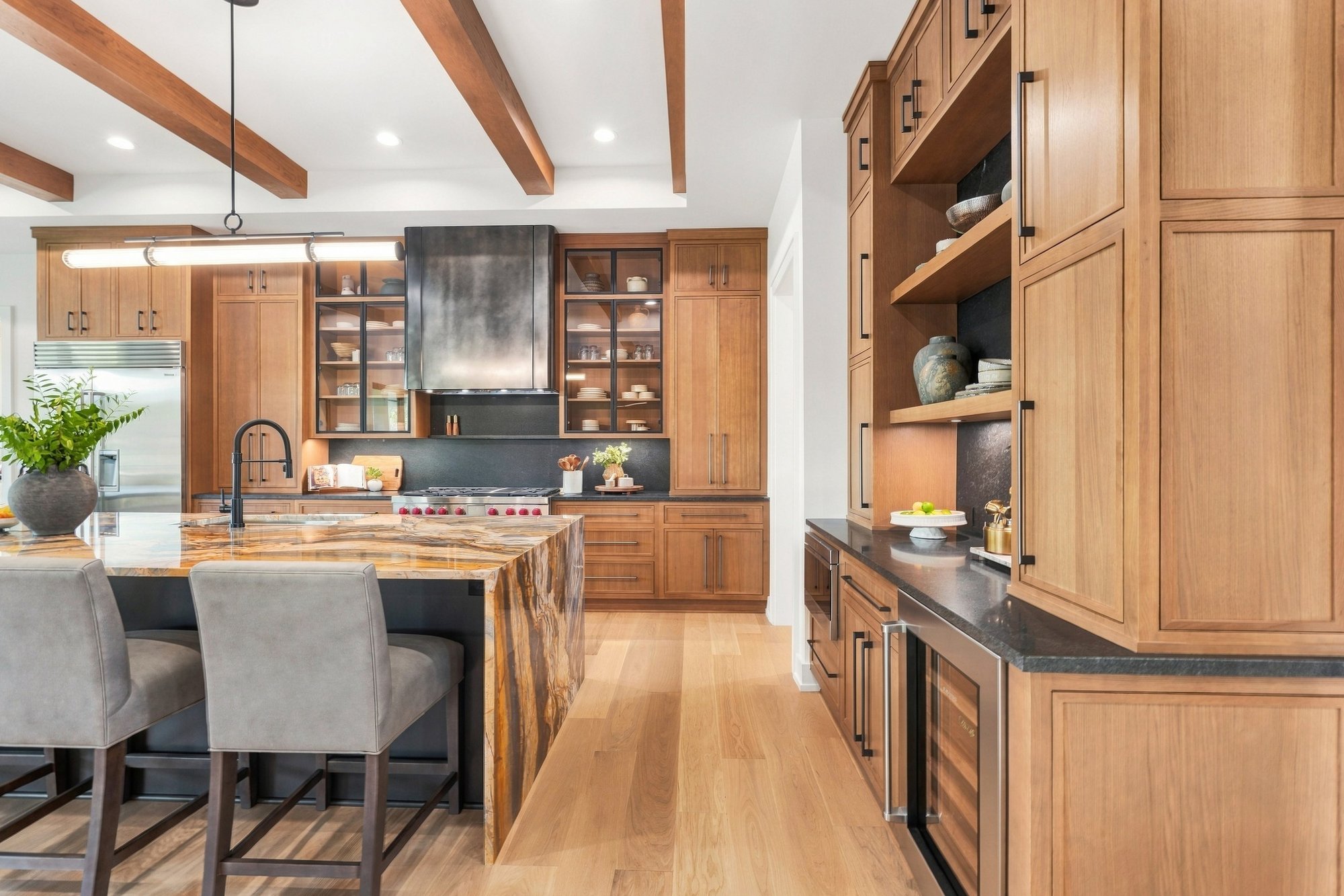 Exhale 2026 Parade Home — White-oak cabinetry and beverage center